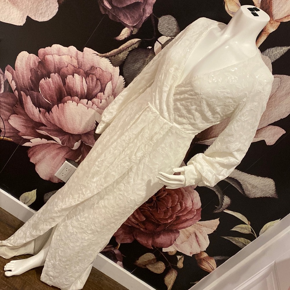 Beautiful White Dress with Slit ( will need a dry clean )